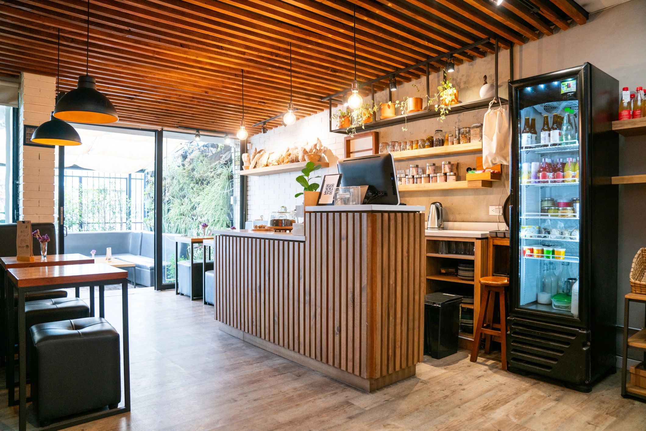 Cozy coffee shop interior with warm lighting