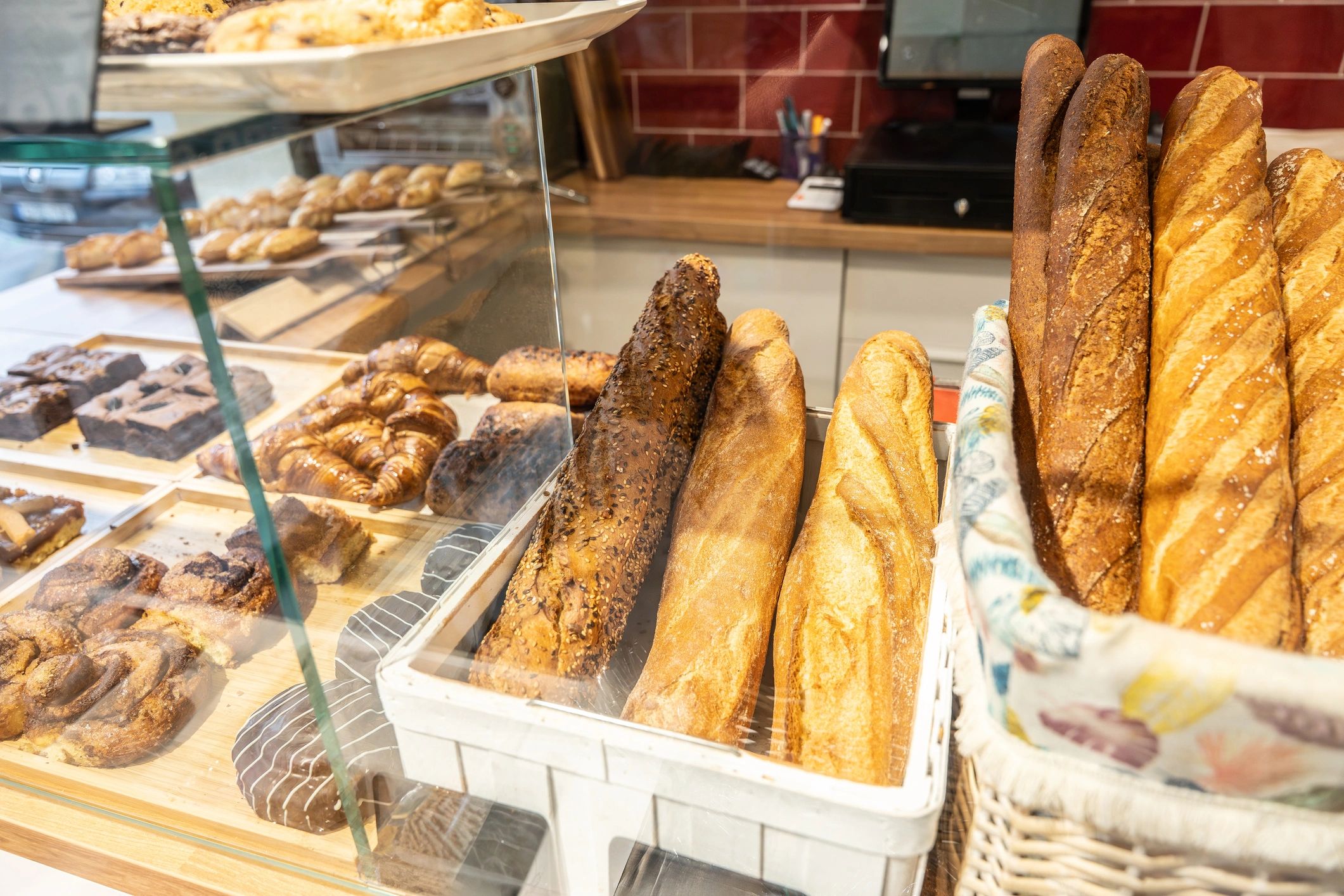Bakery counter display with fresh pastries